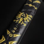 Black Master Sword replica from Legend of Zelda with detailed scabbard and Triforce emblem