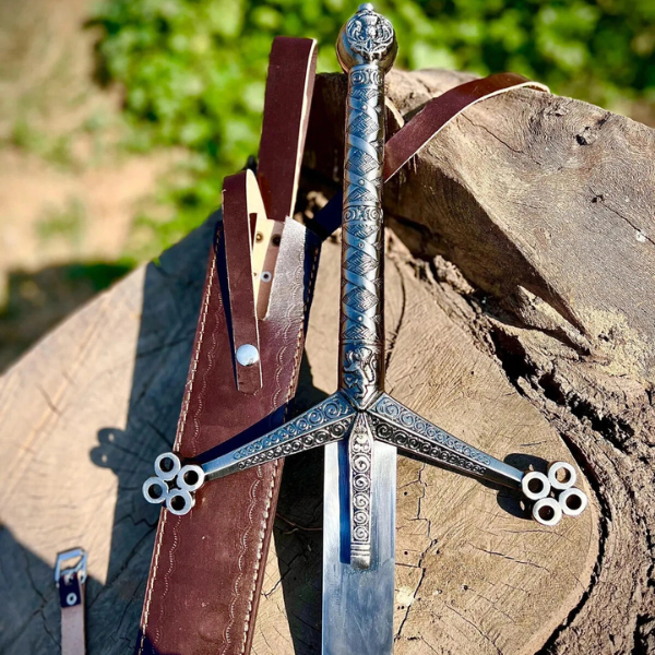 Close-up of the Handmade Scottish Claymore Sword by Ashblades showing genuine leather-wrapped grip and traditional crossguard. Crafted for historical accuracy and ceremonial use, perfect for Highland fans and cosplay warriors. Close-up of the Handmade Scottish Claymore Sword by Ashblades showing genuine leather-wrapped grip and traditional crossguard. Crafted for historical accuracy and ceremonial use, perfect for Highland fans and cosplay warriors.