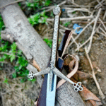 Close-up of the Handmade Scottish Claymore Sword by Ashblades showing genuine leather-wrapped grip and traditional crossguard. Crafted for historical accuracy and ceremonial use, perfect for Highland fans and cosplay warriors.