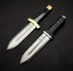 Full-length image of the Thorfinn Dual Daggers Replica by Ashblades, a matching pair of anime-accurate blades inspired by Vinland Saga. Each dagger features a hand-forged D2 steel blade, leather-wrapped grip, and bull horn accents. Ideal for cosplay, anime weapon collections, and Viking-themed fantasy setups.